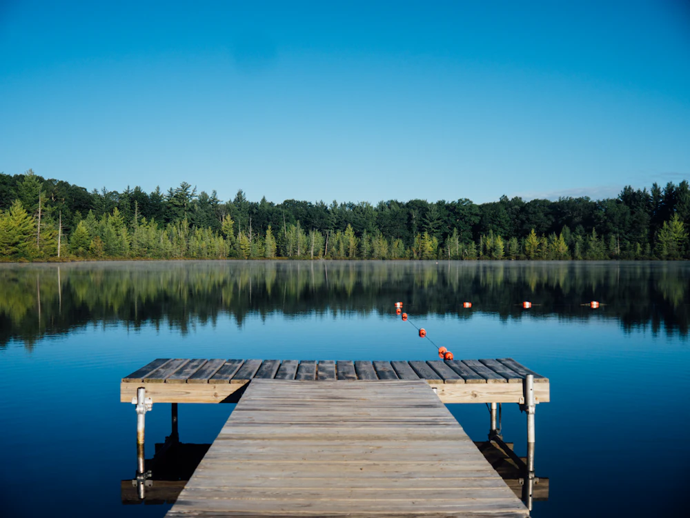 Quiet New Hampshire lake and pine forest near Derry, NH, inside the Vorenza delivery area